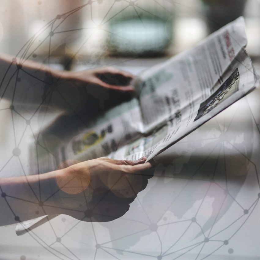 man-reading-newspaper